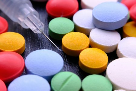 Pillen en injectiespuit